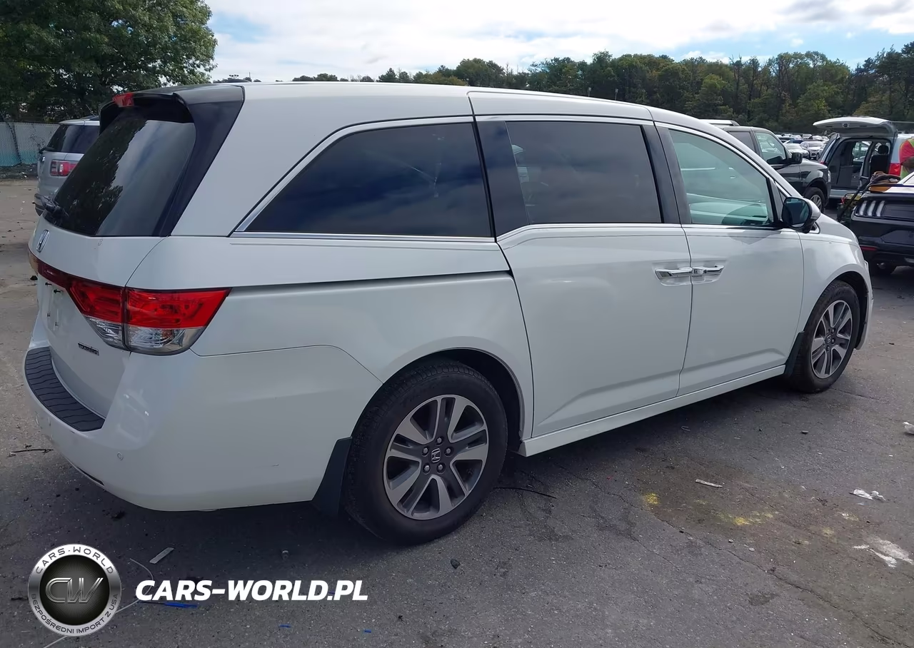 2016 Honda Odyssey Touring-Touring Elite VIN:5FNRL5H95GB154987 - 4