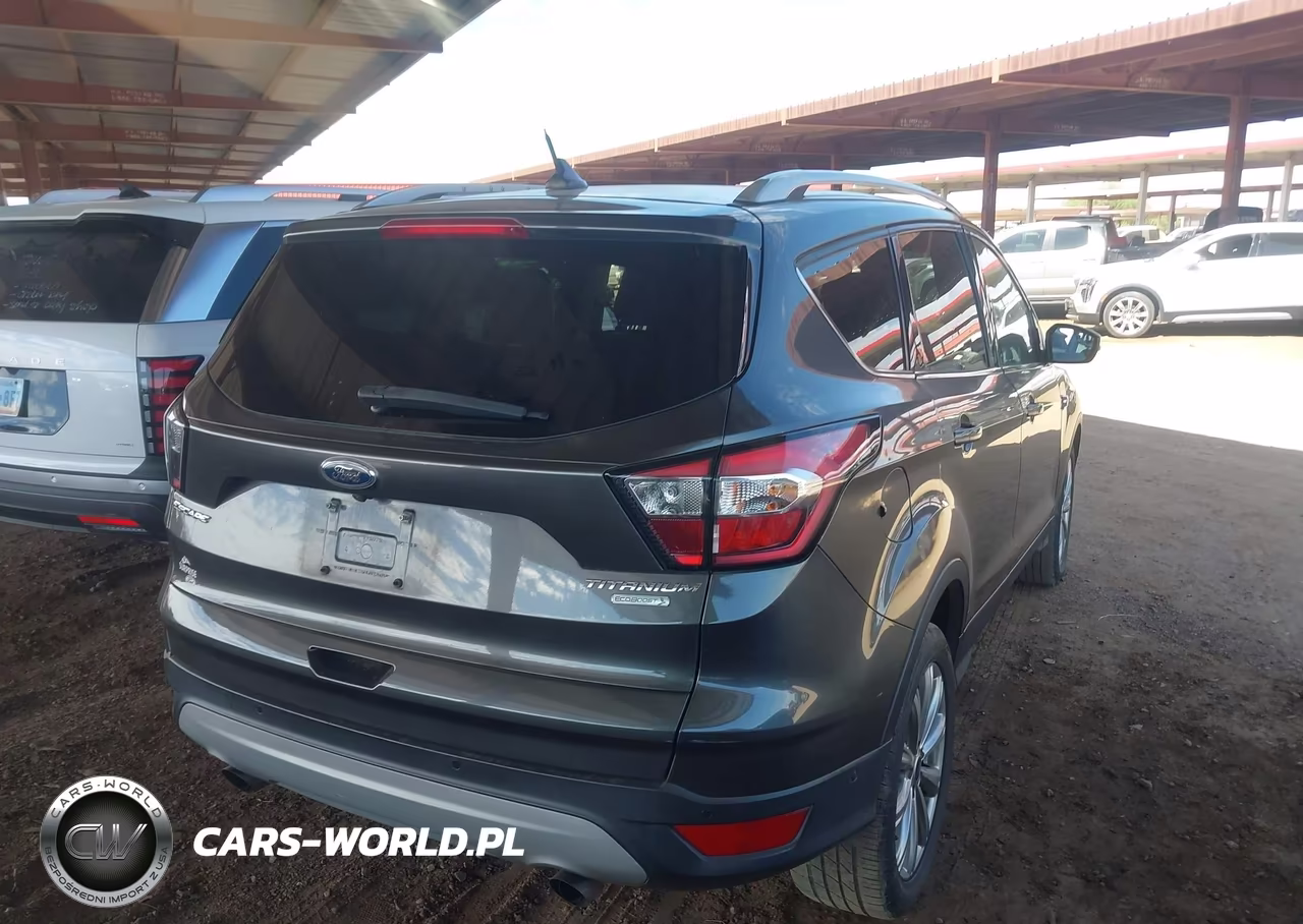 2018 Ford Escape Titanium VIN:1FMCU0J93JUC88066 - 4