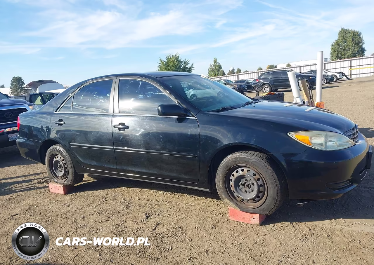 2003 Toyota Camry Le VIN:JTDBE32K930150901 - 14