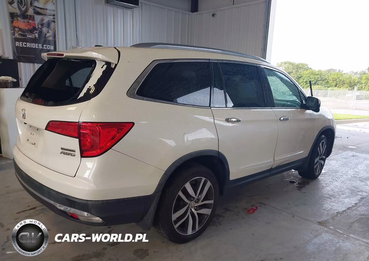 2017 Honda Pilot Touring VIN:5FNYF6H95HB092632 - 4