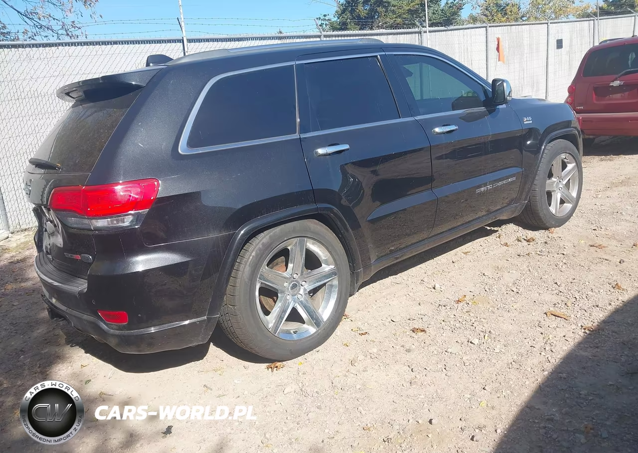 2014 Jeep Grand Cherokee Overland VIN:1C4RJFCT3EC128249 - 4