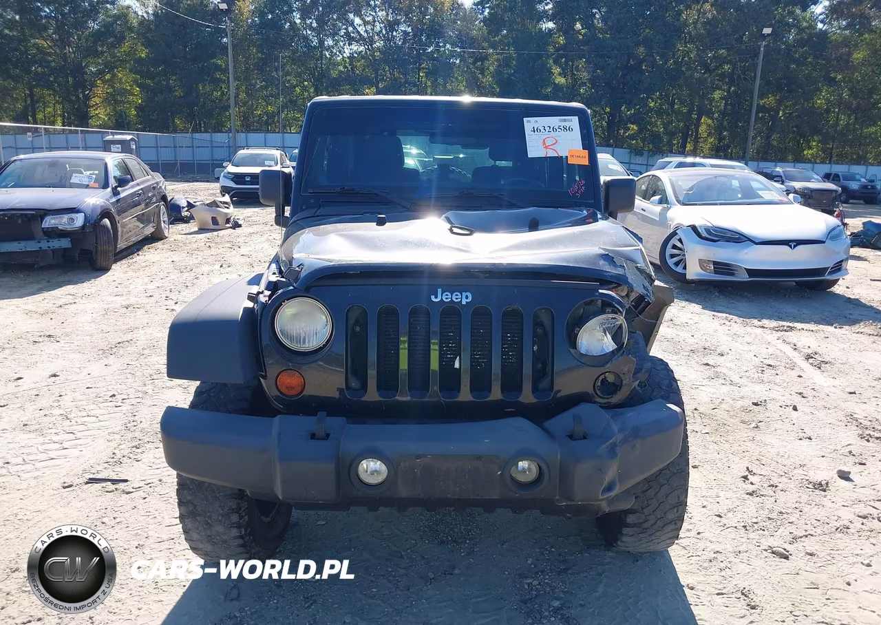 2012 Jeep Wrangler Sport VIN:1C4AJWAG5CL253835 - 12