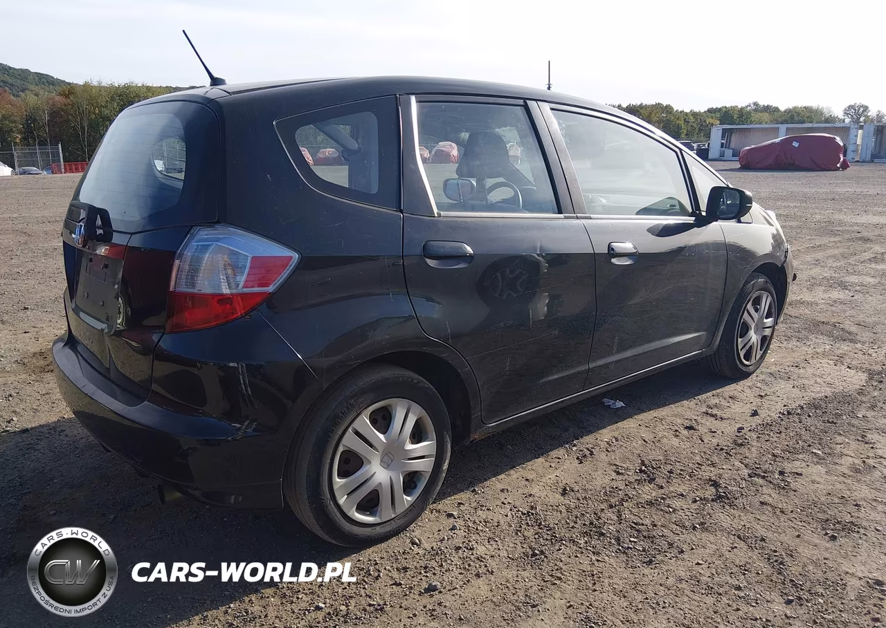 2009 Honda Fit VIN:JHMGE88229S061919 - 4
