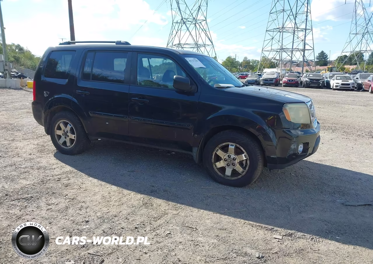2011 Honda Pilot Touring VIN:5FNYF4H90BB011676 - 1