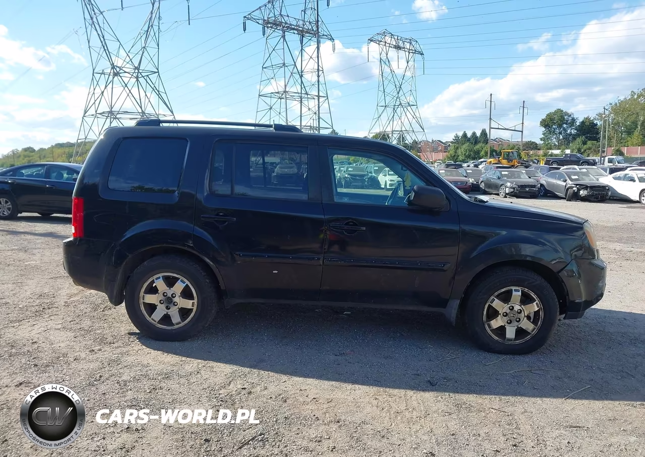 2011 Honda Pilot Touring VIN:5FNYF4H90BB011676 - 12