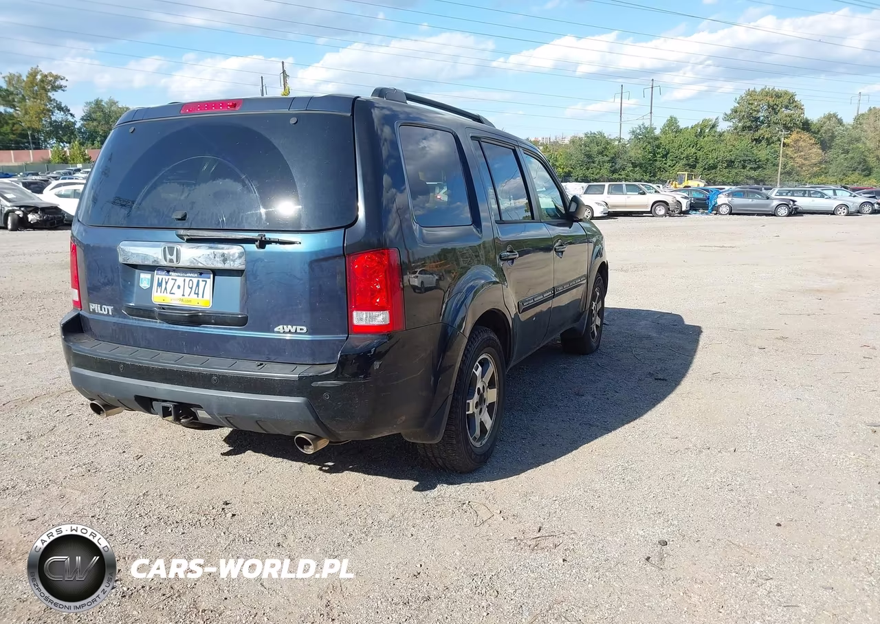 2011 Honda Pilot Touring VIN:5FNYF4H90BB011676 - 4