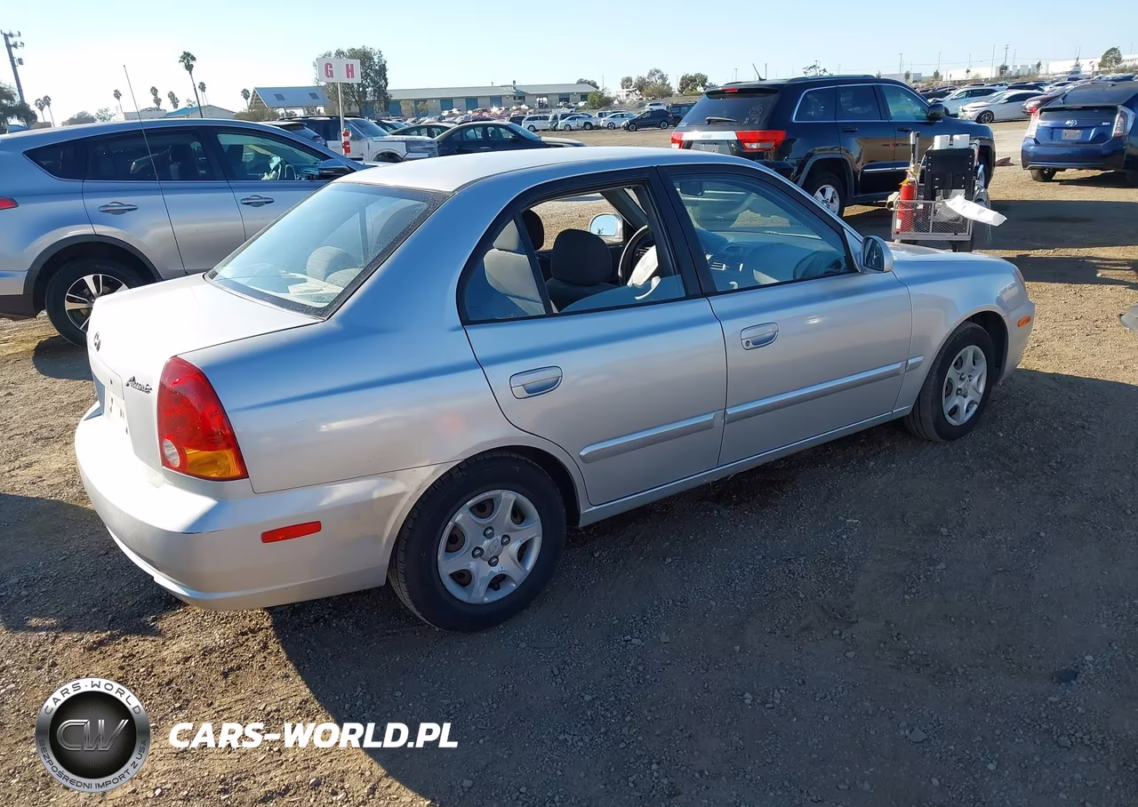 2005 Hyundai Accent Gls VIN:KMHCG45C15U576629 - 4