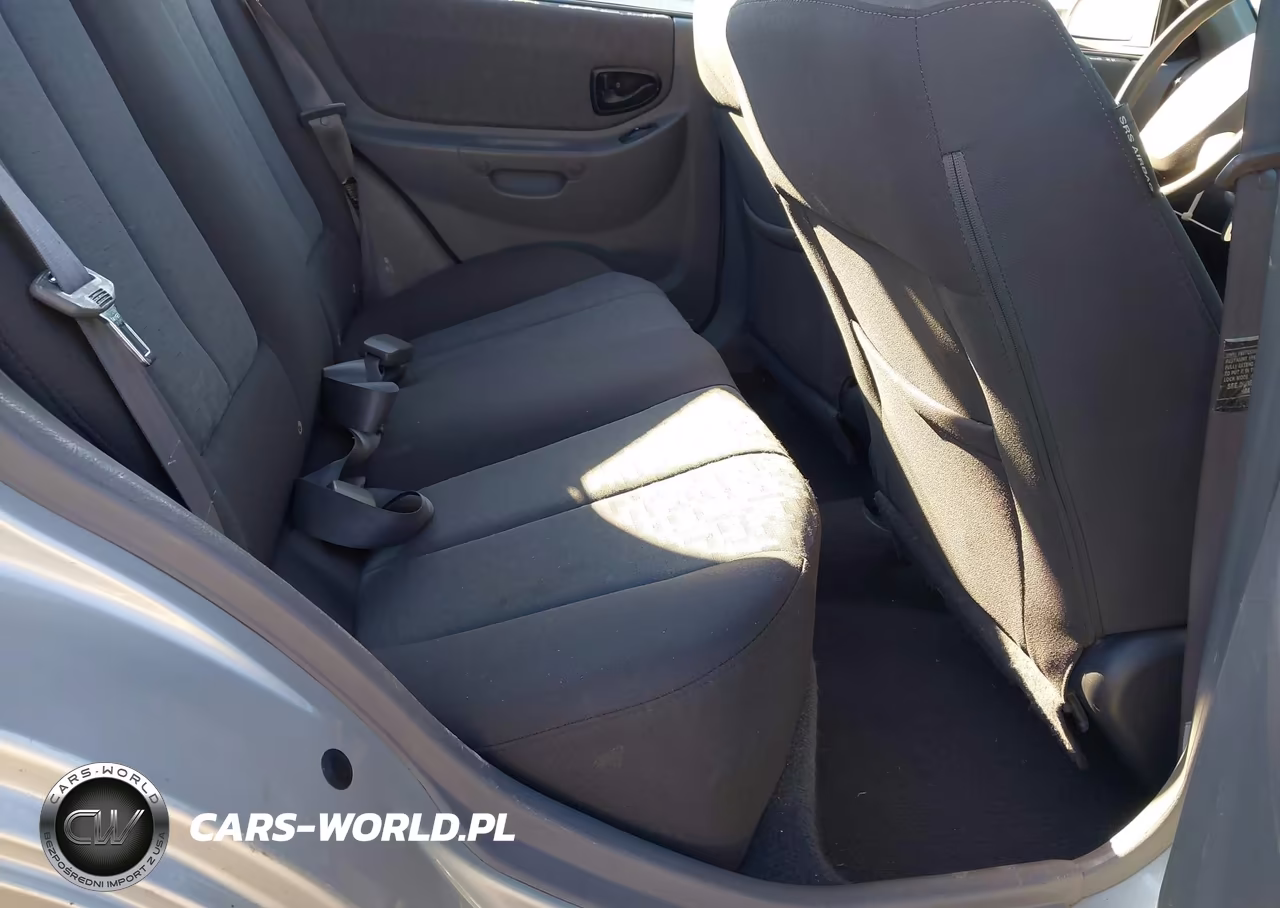 2005 Hyundai Accent Gls VIN:KMHCG45C15U576629 - 8