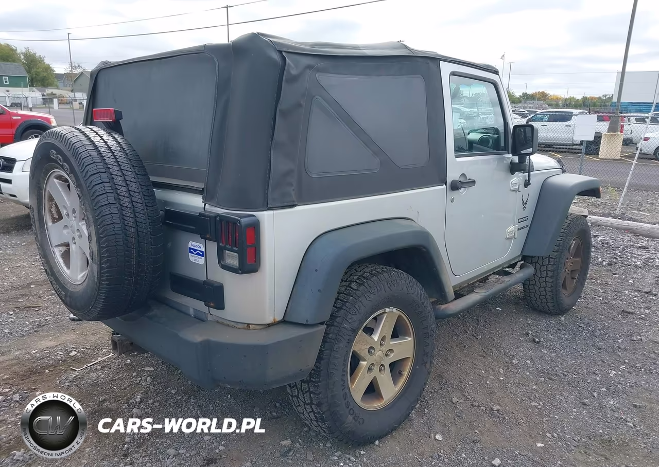 2012 Jeep Wrangler Sport VIN:1C4AJWAG5CL252247 - 4