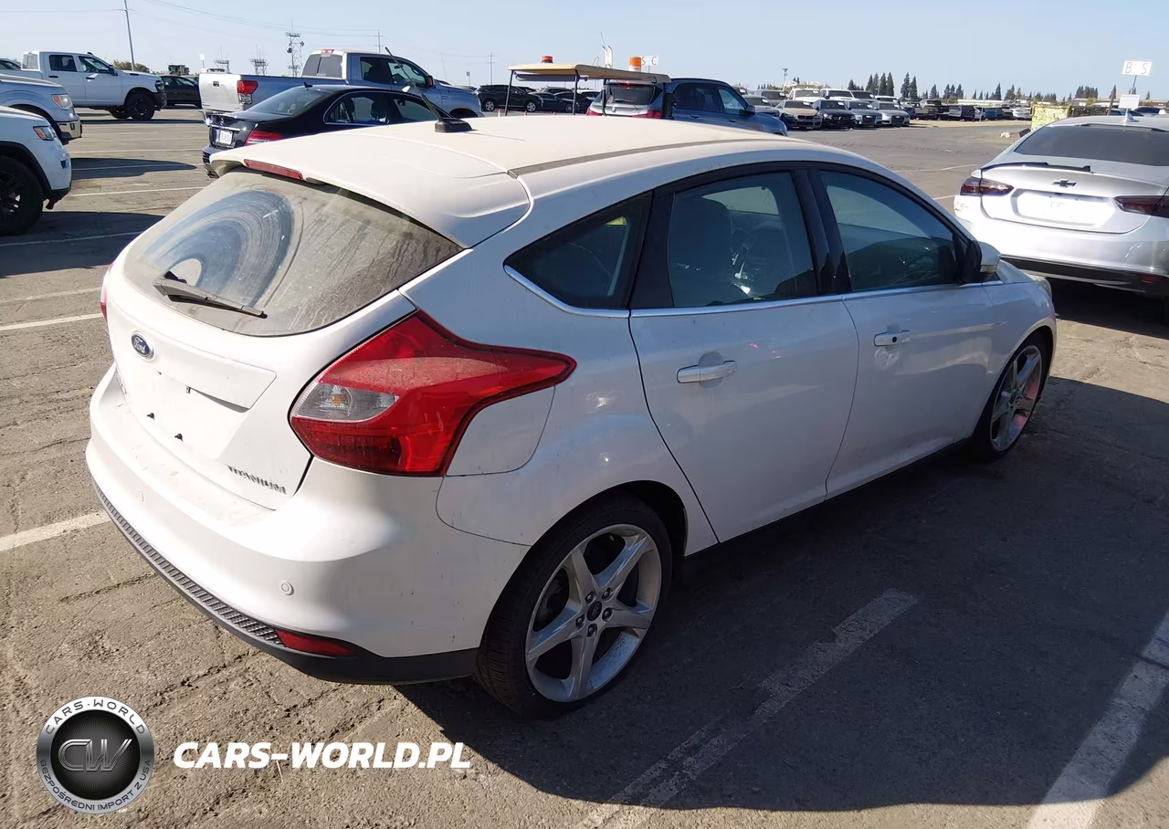 2014 Ford Focus Titanium VIN:1FADP3N28EL110878 - 4