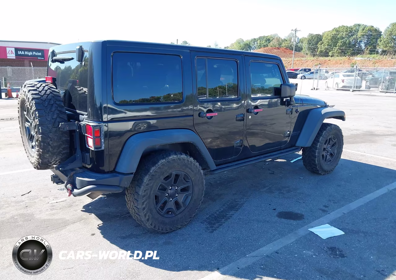 2013 Jeep Wrangler Unlimited Sahara VIN:1C4BJWEGXDL563446 - 4