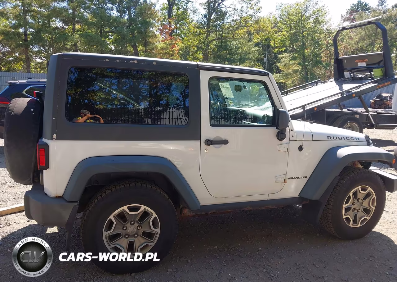 2013 Jeep Wrangler Rubicon VIN:1C4BJWCG4DL569066 - 13