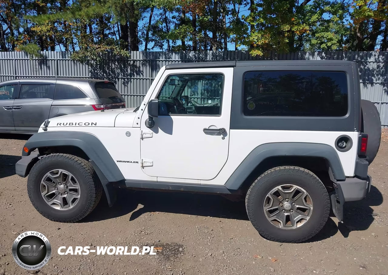 2013 Jeep Wrangler Rubicon VIN:1C4BJWCG4DL569066 - 14