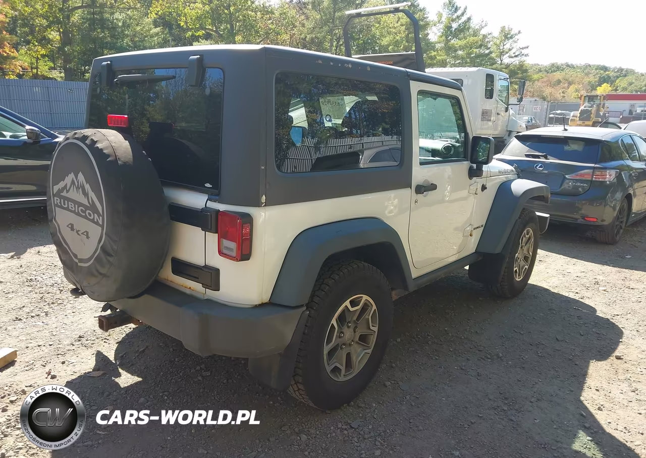 2013 Jeep Wrangler Rubicon VIN:1C4BJWCG4DL569066 - 4