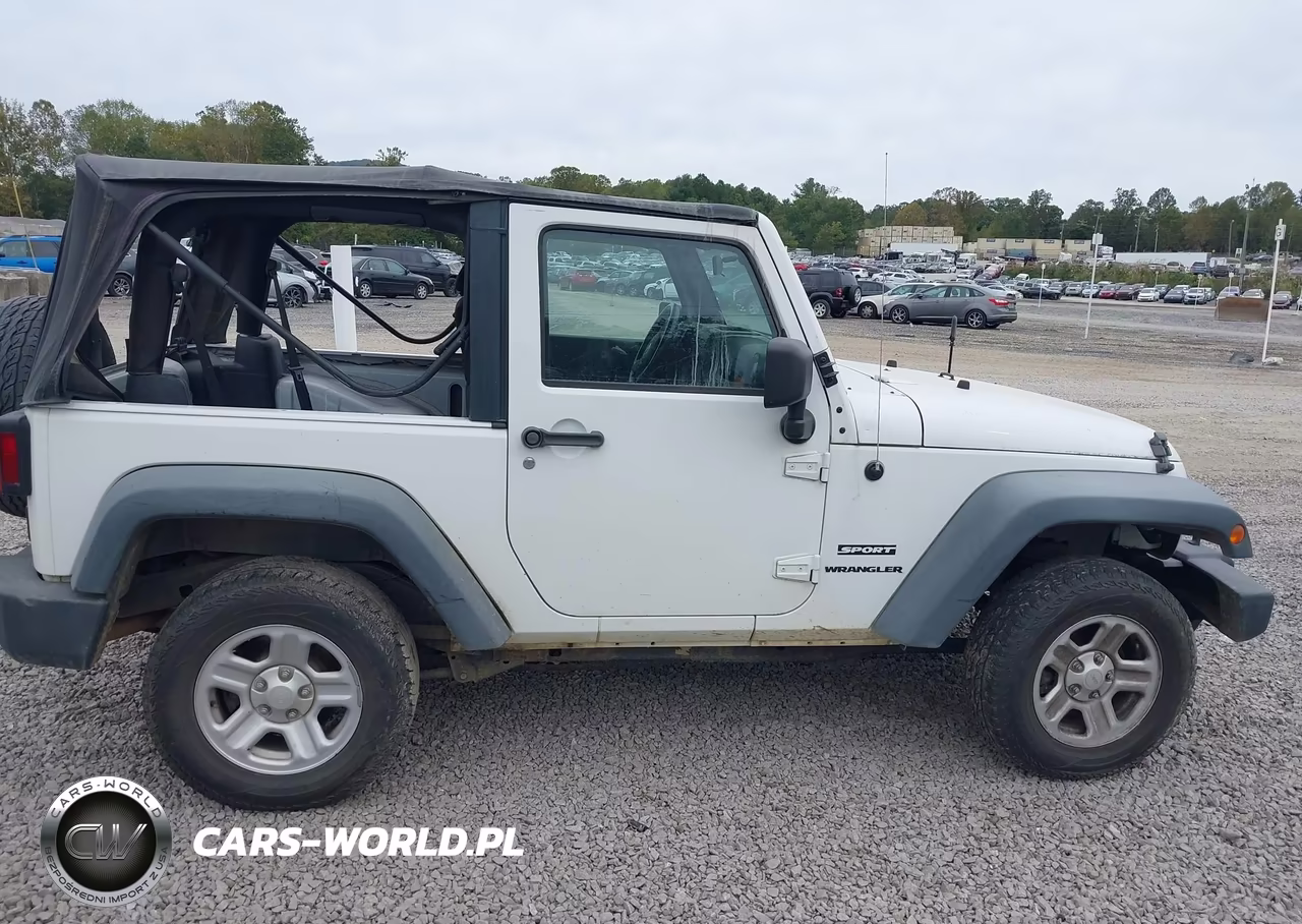 2011 Jeep Wrangler Sport VIN:1J4AA2D14BL577819 - 13