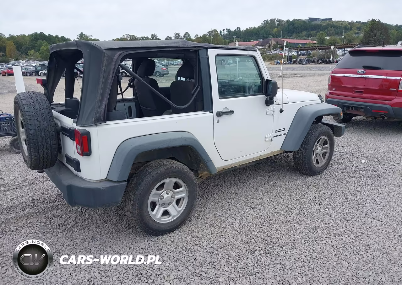 2011 Jeep Wrangler Sport VIN:1J4AA2D14BL577819 - 4