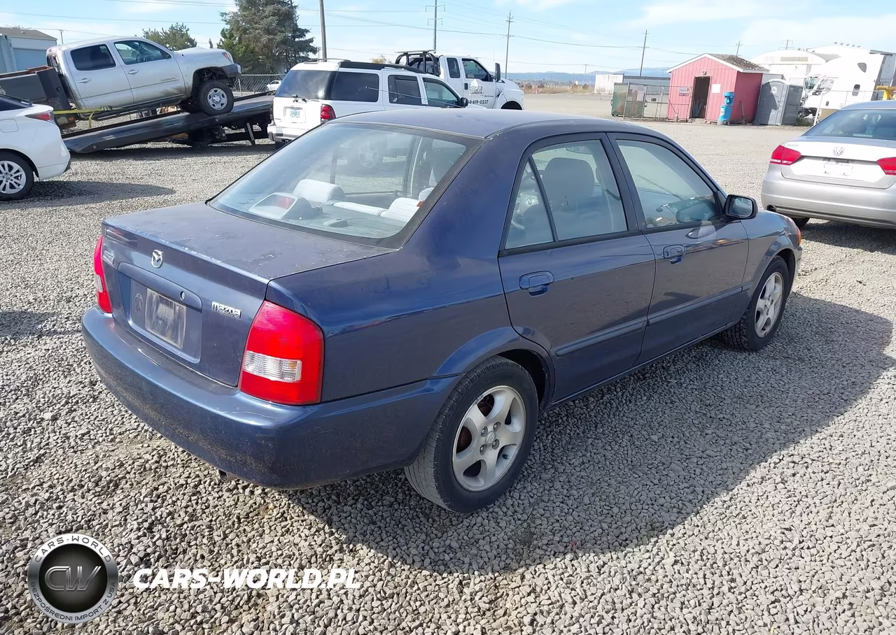 2000 Mazda Protege Es VIN:JM1BJ2213Y0212197 - 4