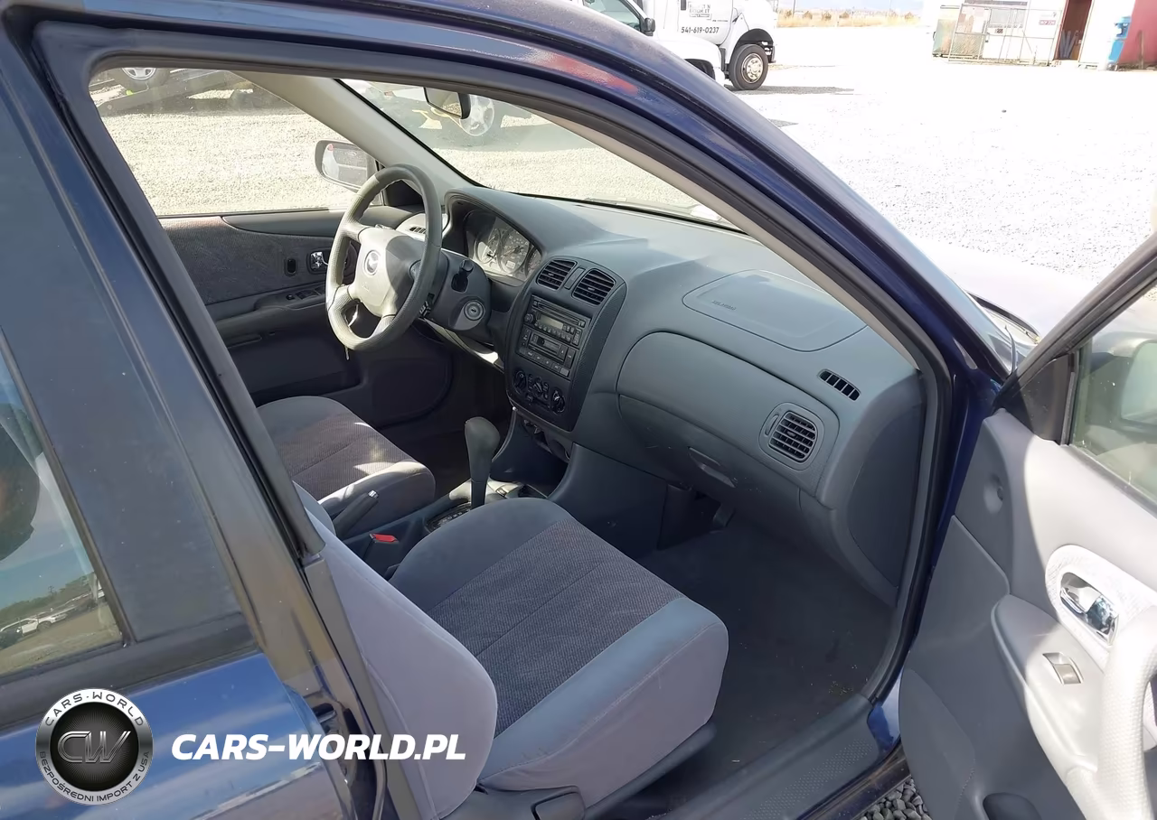 2000 Mazda Protege Es VIN:JM1BJ2213Y0212197 - 5