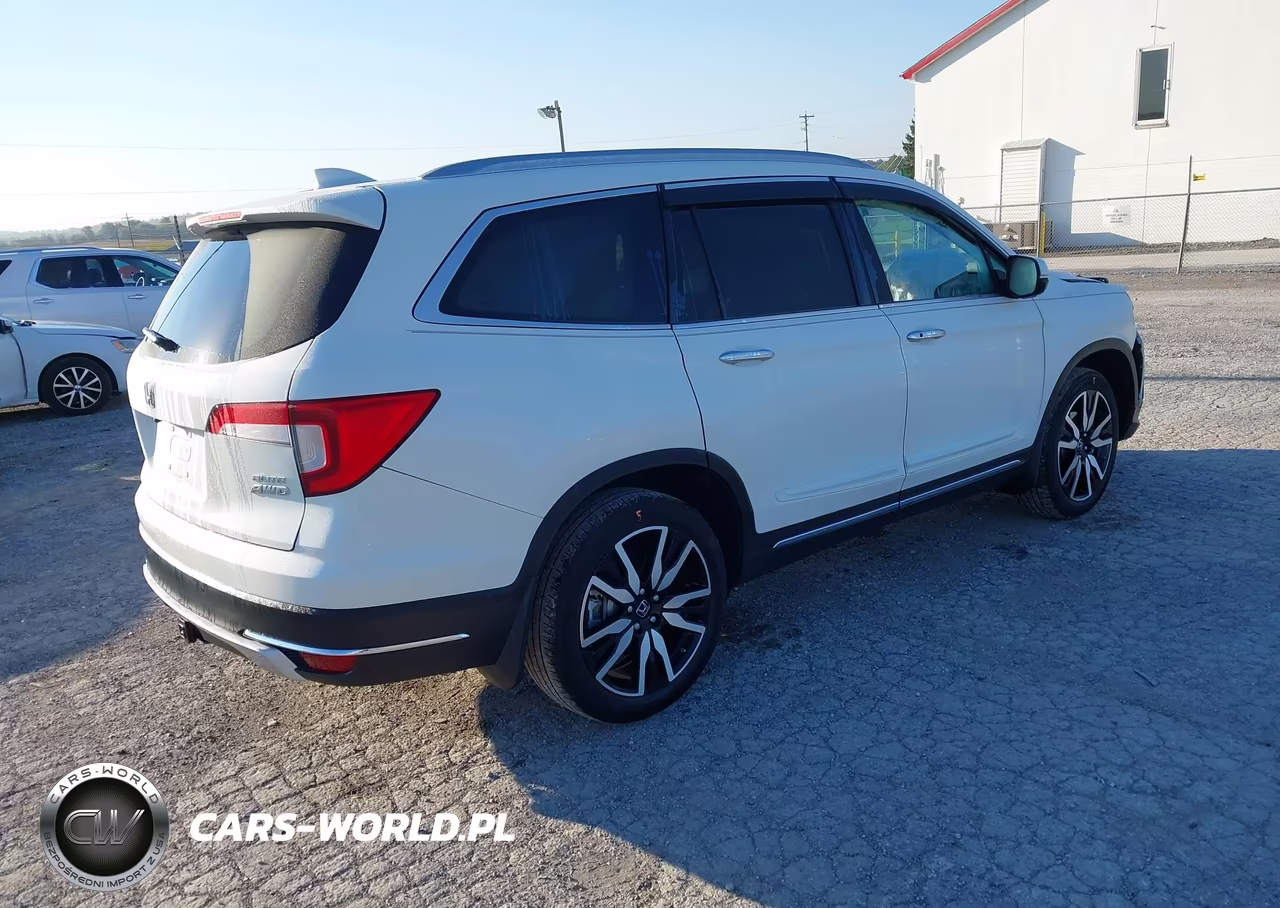 2019 Honda Pilot Elite VIN:5FNYF6H07KB005239 - 4