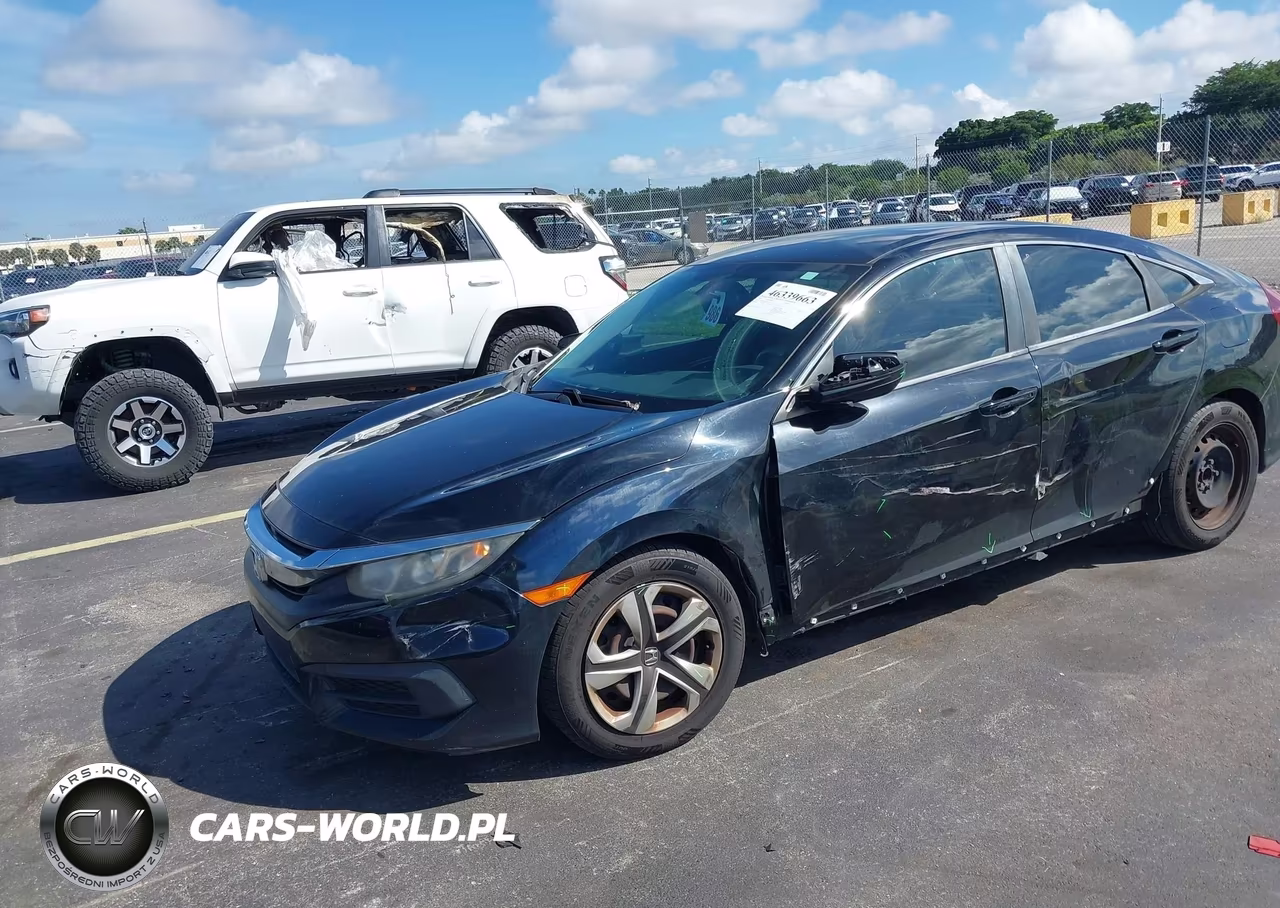 2018 Honda Civic Lx VIN:19XFC2E52JE001144 - 2