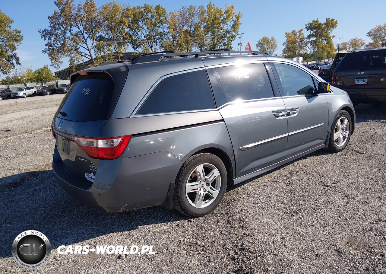 2011 Honda Odyssey Touring-Touring Elite VIN:5FNRL5H9XBB025846 - 4