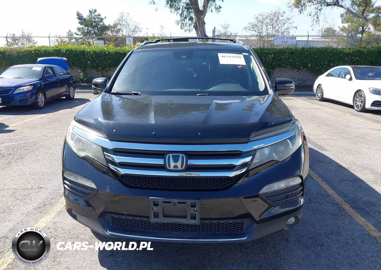 2016 Honda Pilot Touring VIN:5FNYF5H95GB041561 - 12