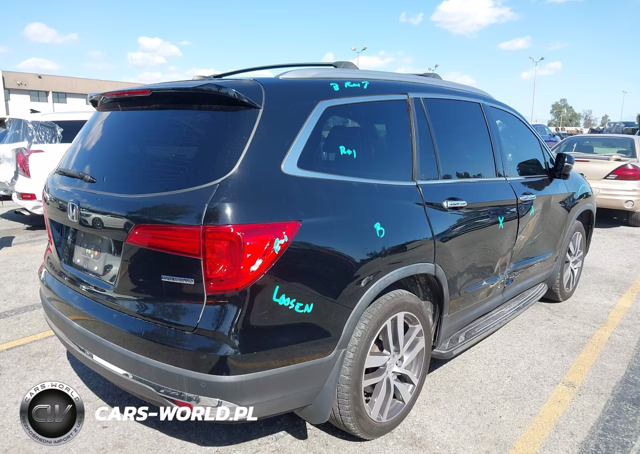 2016 Honda Pilot Touring VIN:5FNYF5H95GB041561 - 4