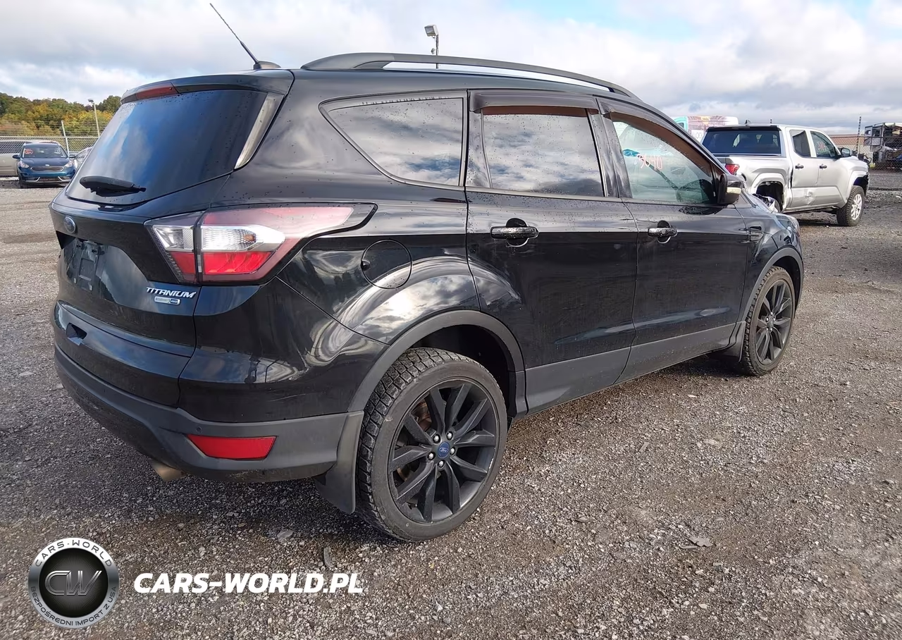 2017 Ford Escape Titanium VIN:1FMCU9J9XHUA57292 - 4