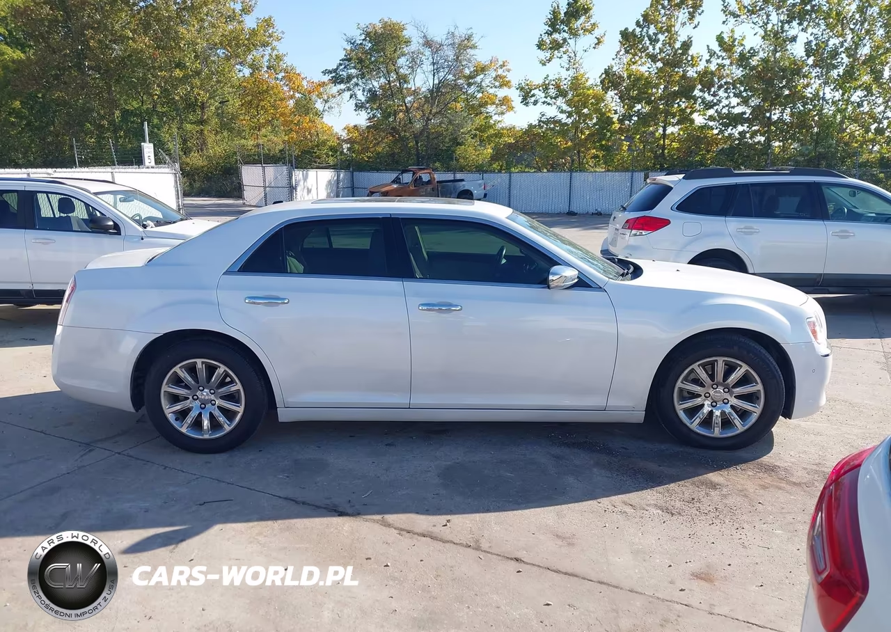 2014 Chrysler 300C VIN:2C3CCAET9EH250700 - 13