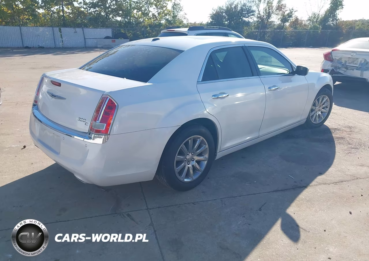 2014 Chrysler 300C VIN:2C3CCAET9EH250700 - 4
