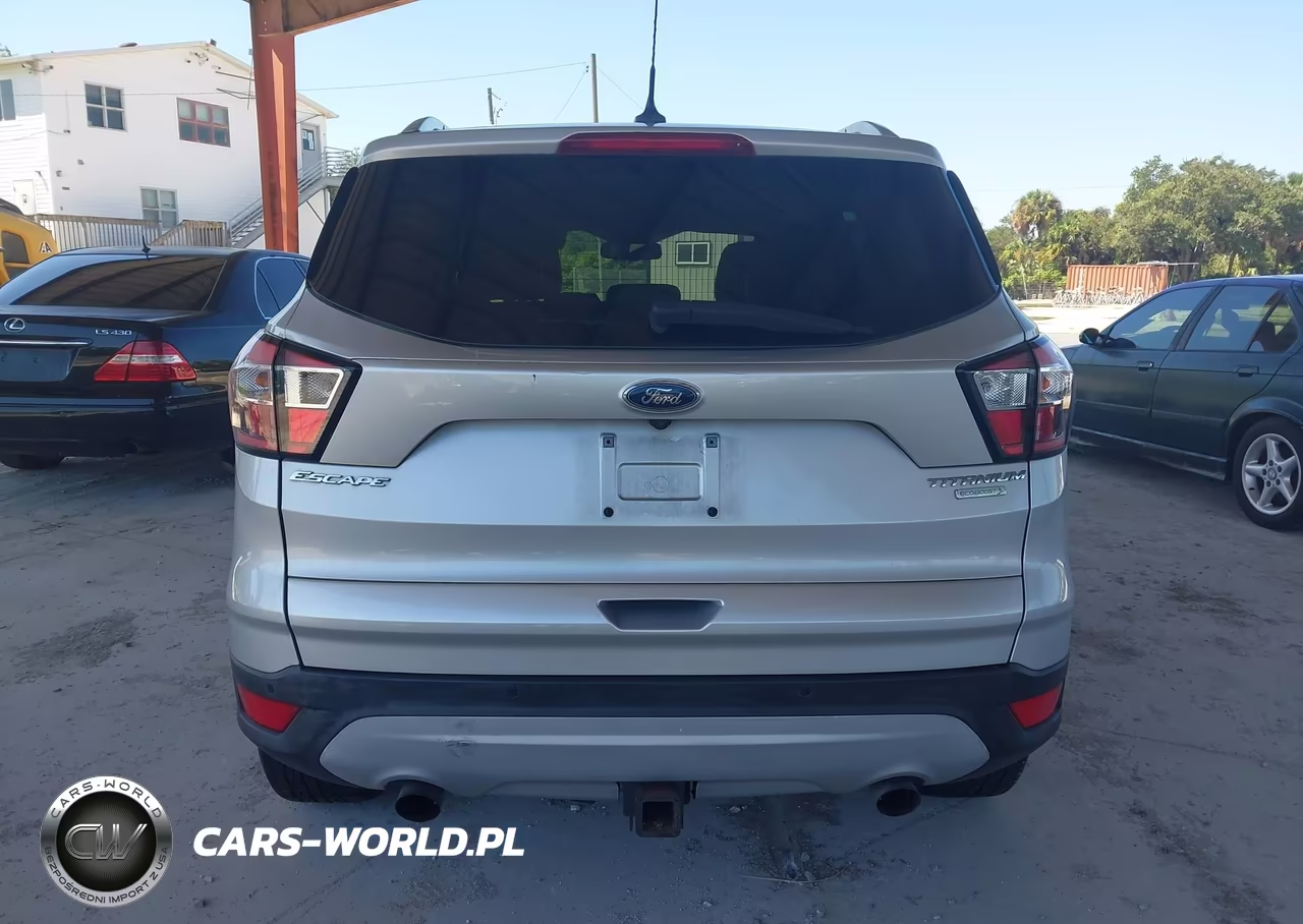 2018 Ford Escape Titanium VIN:1FMCU0J95JUD00654 - 16