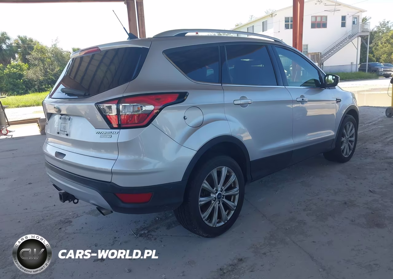 2018 Ford Escape Titanium VIN:1FMCU0J95JUD00654 - 4