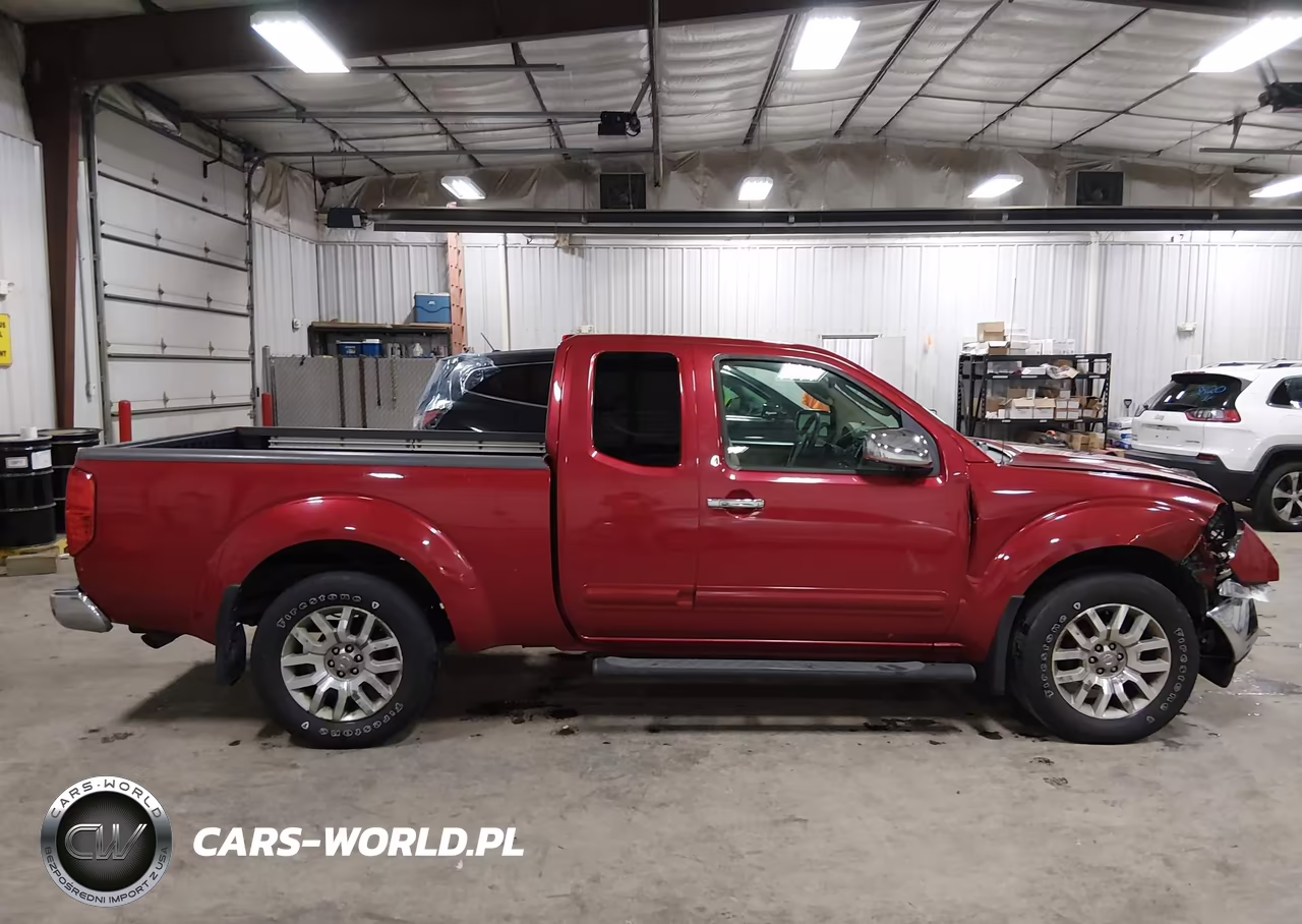 2009 Nissan Frontier Le VIN:1N6AD06W59C412623 - 13