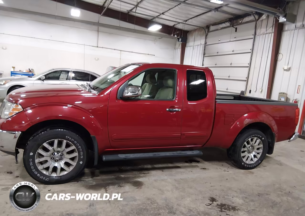 2009 Nissan Frontier Le VIN:1N6AD06W59C412623 - 14