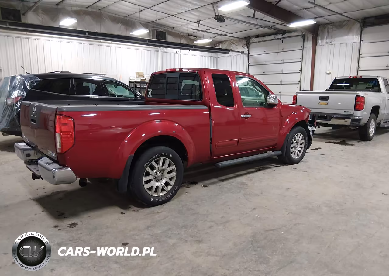 2009 Nissan Frontier Le VIN:1N6AD06W59C412623 - 4