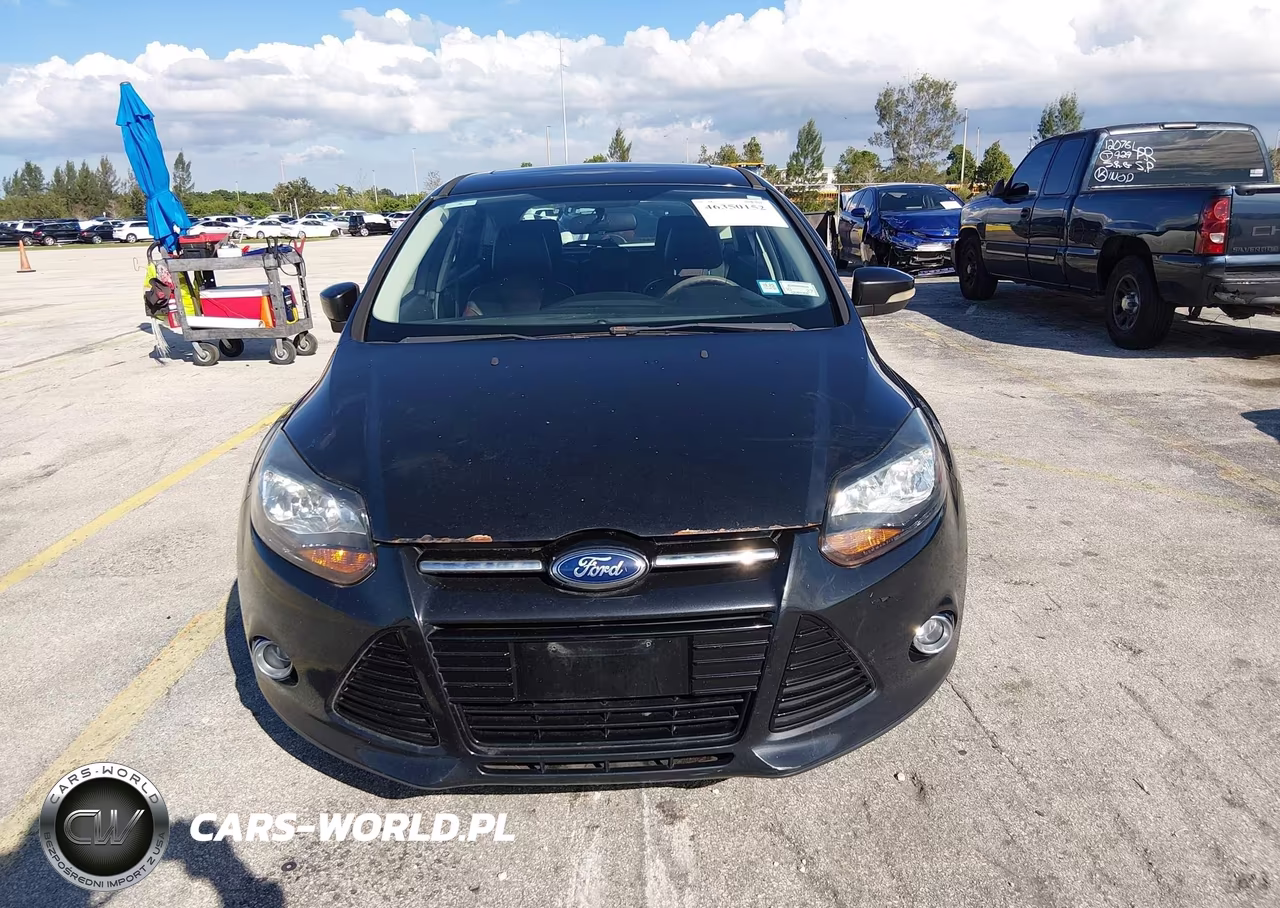 2013 Ford Focus Titanium VIN:1FADP3N21DL198140 - 6