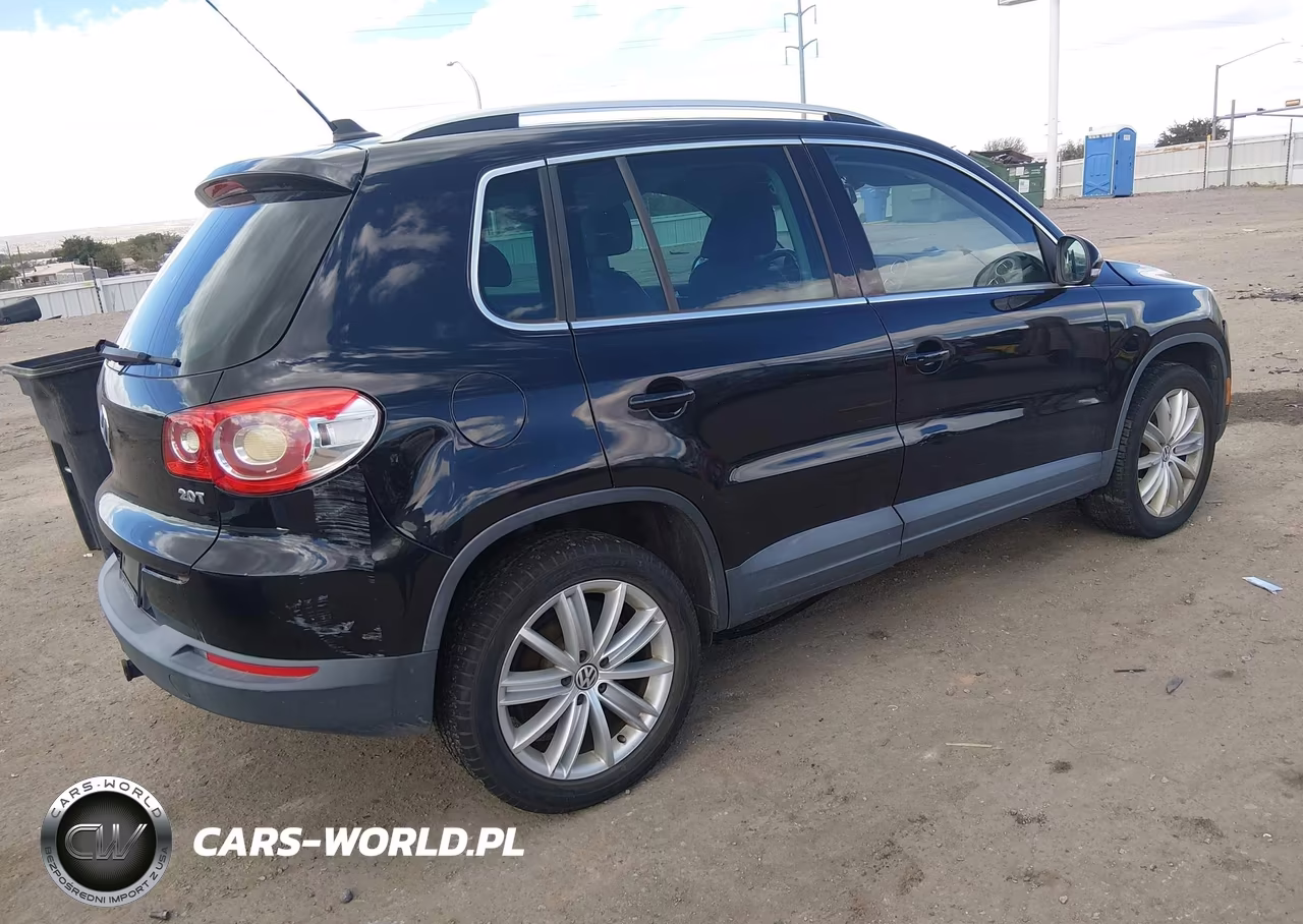 2011 Volkswagen Tiguan Sel VIN:WVGAV7AX6BW548669 - 4