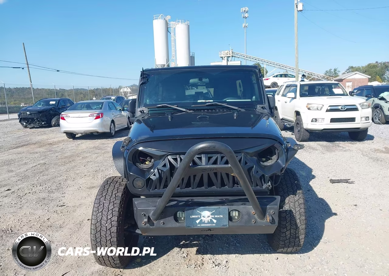 2012 Jeep Wrangler Unlimited Sport VIN:1C4HJWDG7CL182597 - 12