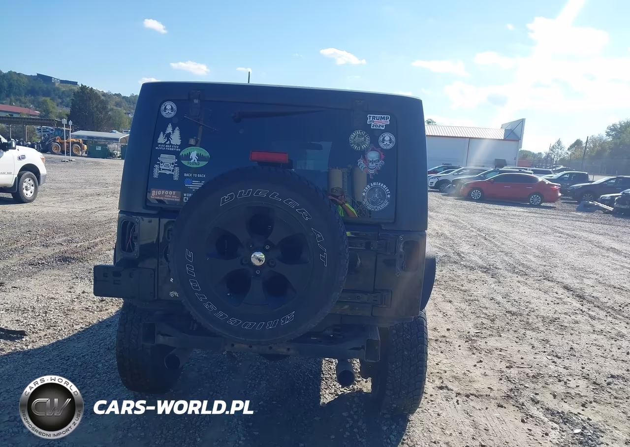 2012 Jeep Wrangler Unlimited Sport VIN:1C4HJWDG7CL182597 - 16