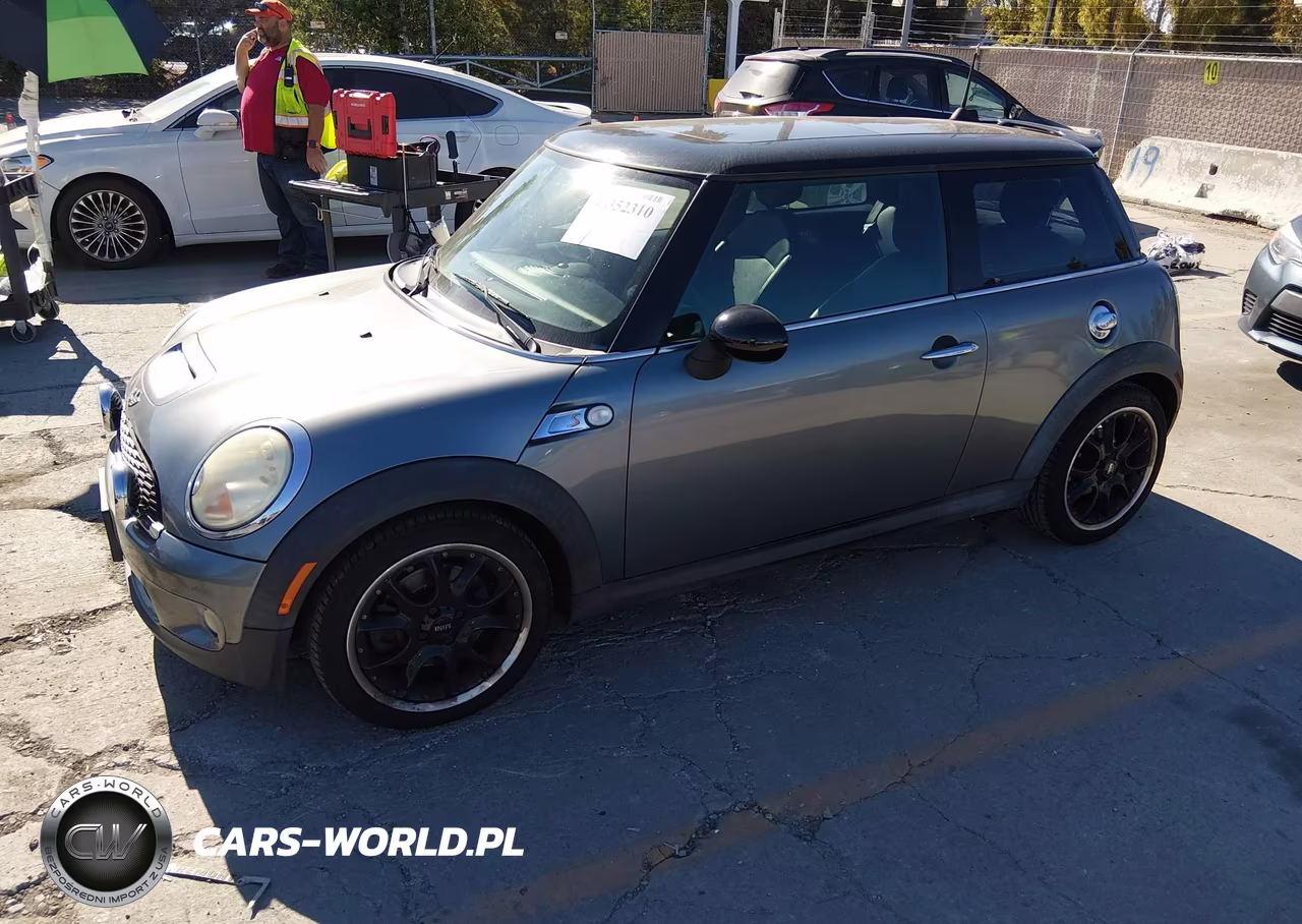 2007 Mini Cooper S VIN:WMWMF73537TL89948 - 2