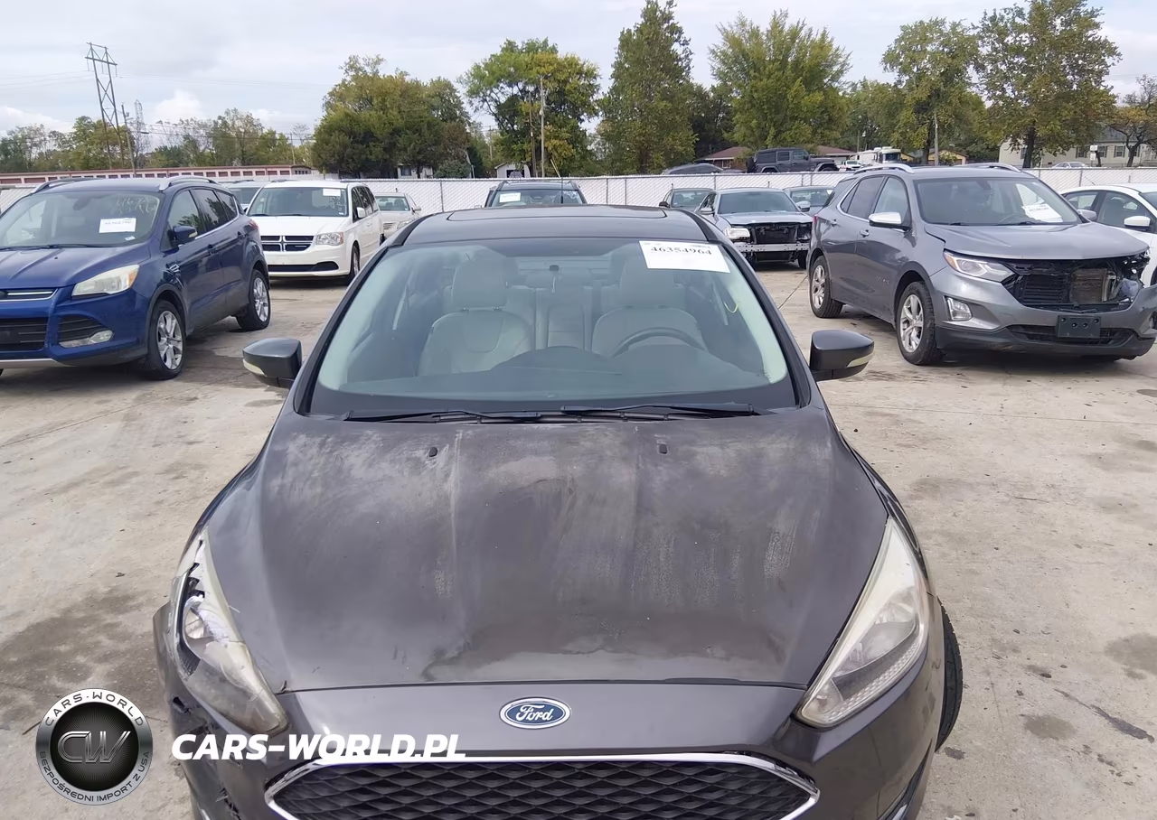 2015 Ford Focus Titanium VIN:1FADP3J20FL241259 - 12