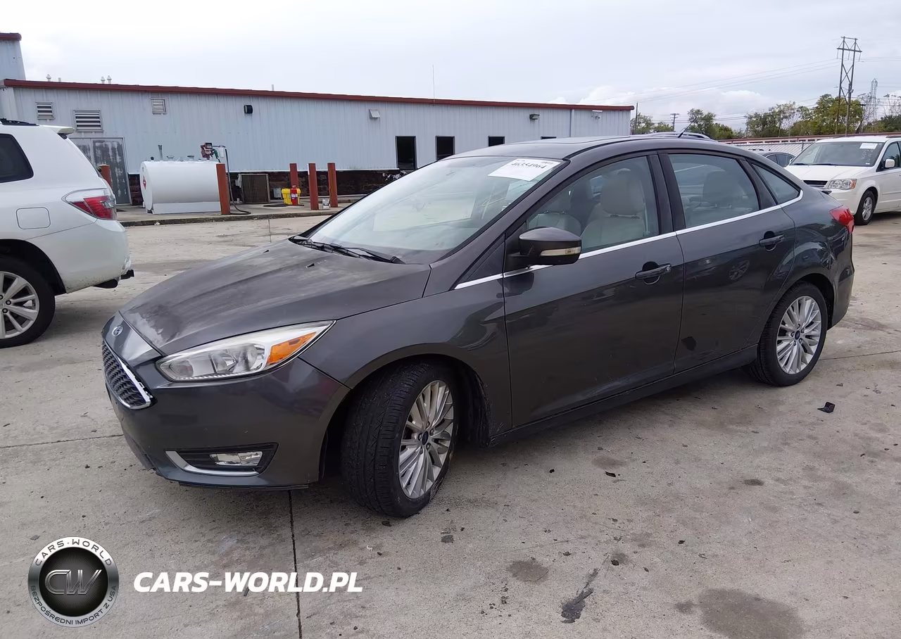 2015 Ford Focus Titanium VIN:1FADP3J20FL241259 - 2