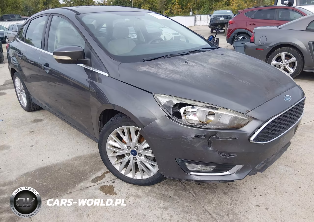 2015 Ford Focus Titanium VIN:1FADP3J20FL241259 - 6