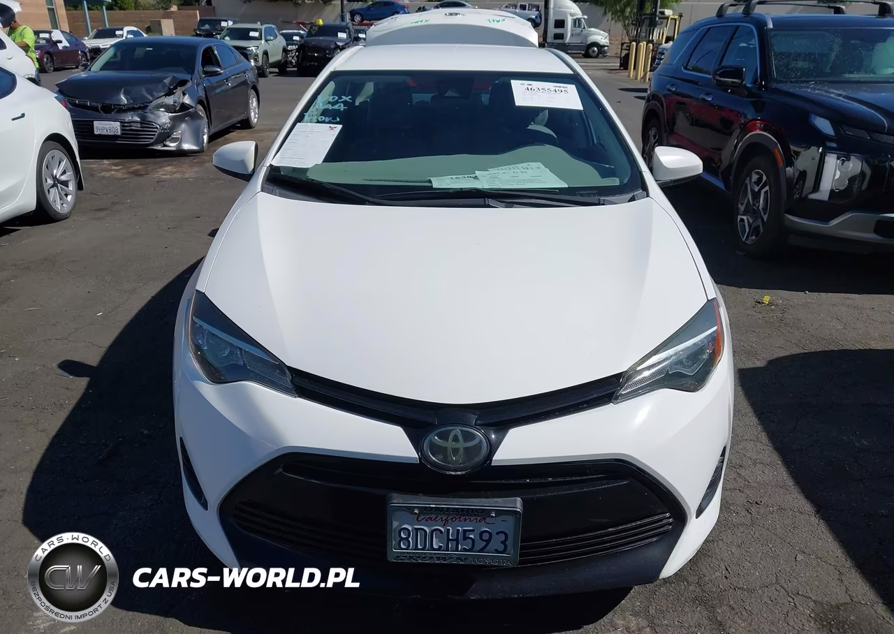 2018 Toyota Corolla Le VIN:5YFBURHE7JP750455 - 13