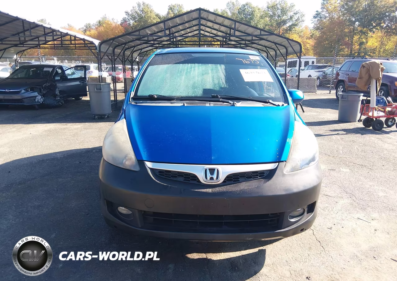 2007 Honda Fit VIN:JHMGD38407S031290 - 12