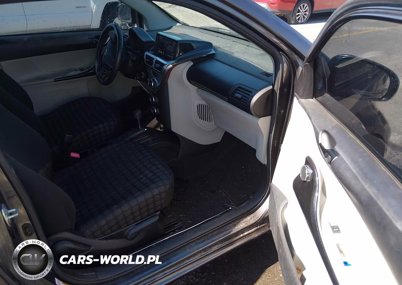 2012 Scion Iq VIN:JTNJJXB03CJ014038 - 5