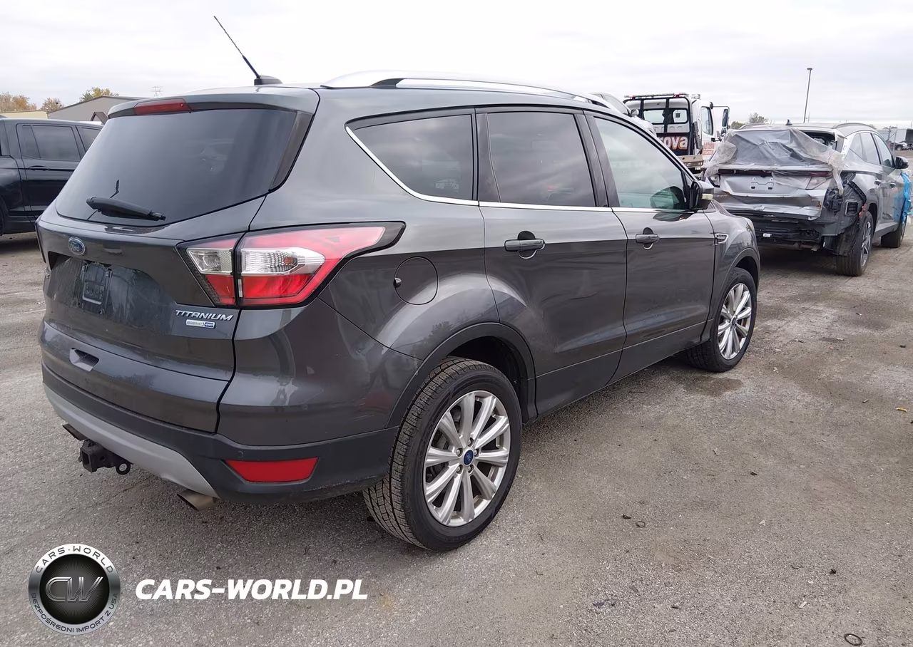 2017 Ford Escape Titanium VIN:1FMCU9J9XHUE58972 - 4