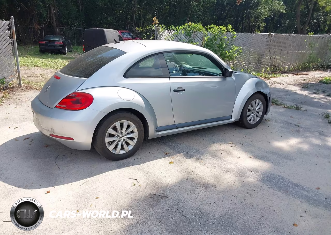 2014 Volkswagen Beetle VIN:3VWFP7AT4EM624957 - 4