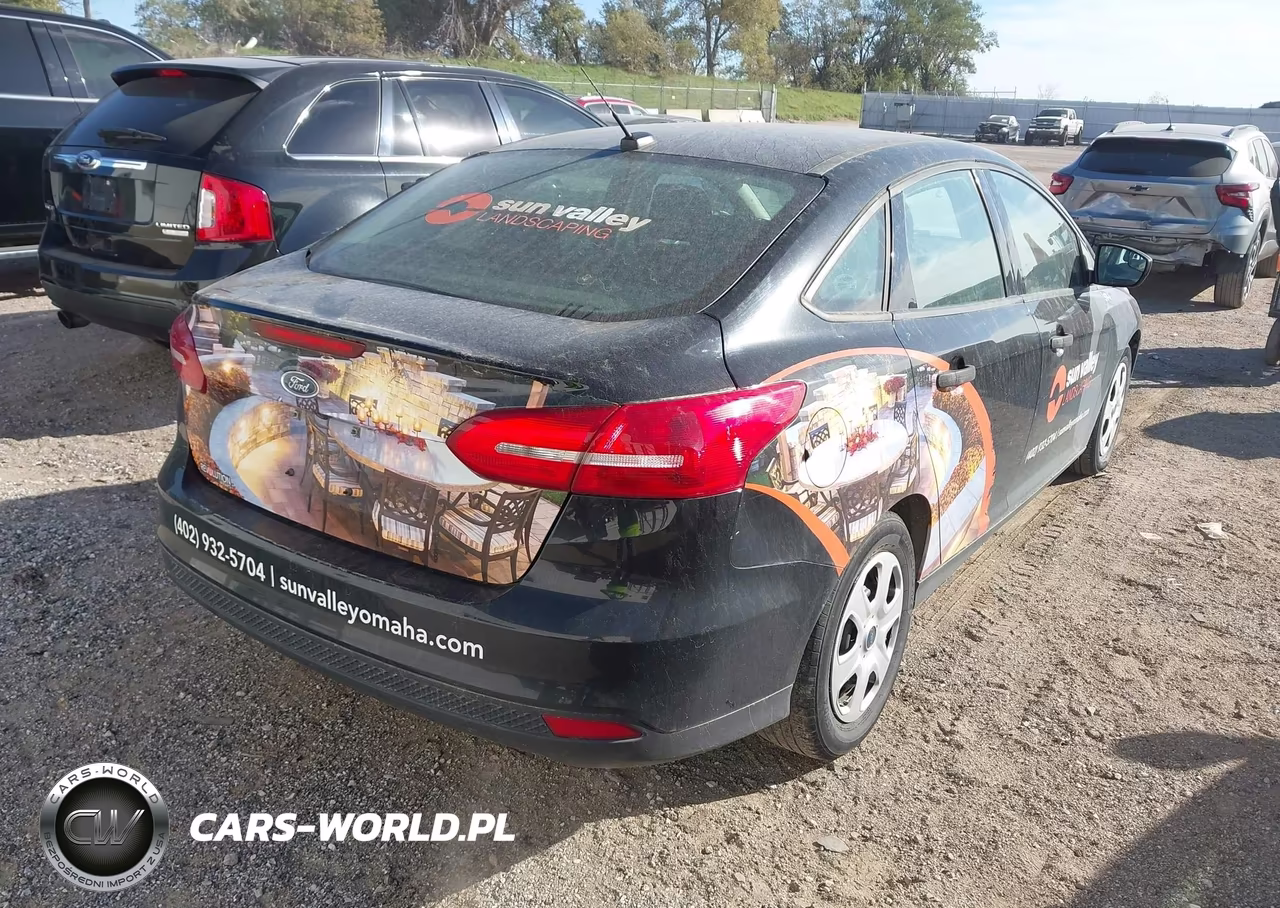 2017 Ford Focus S VIN:1FADP3E25HL308287 - 4