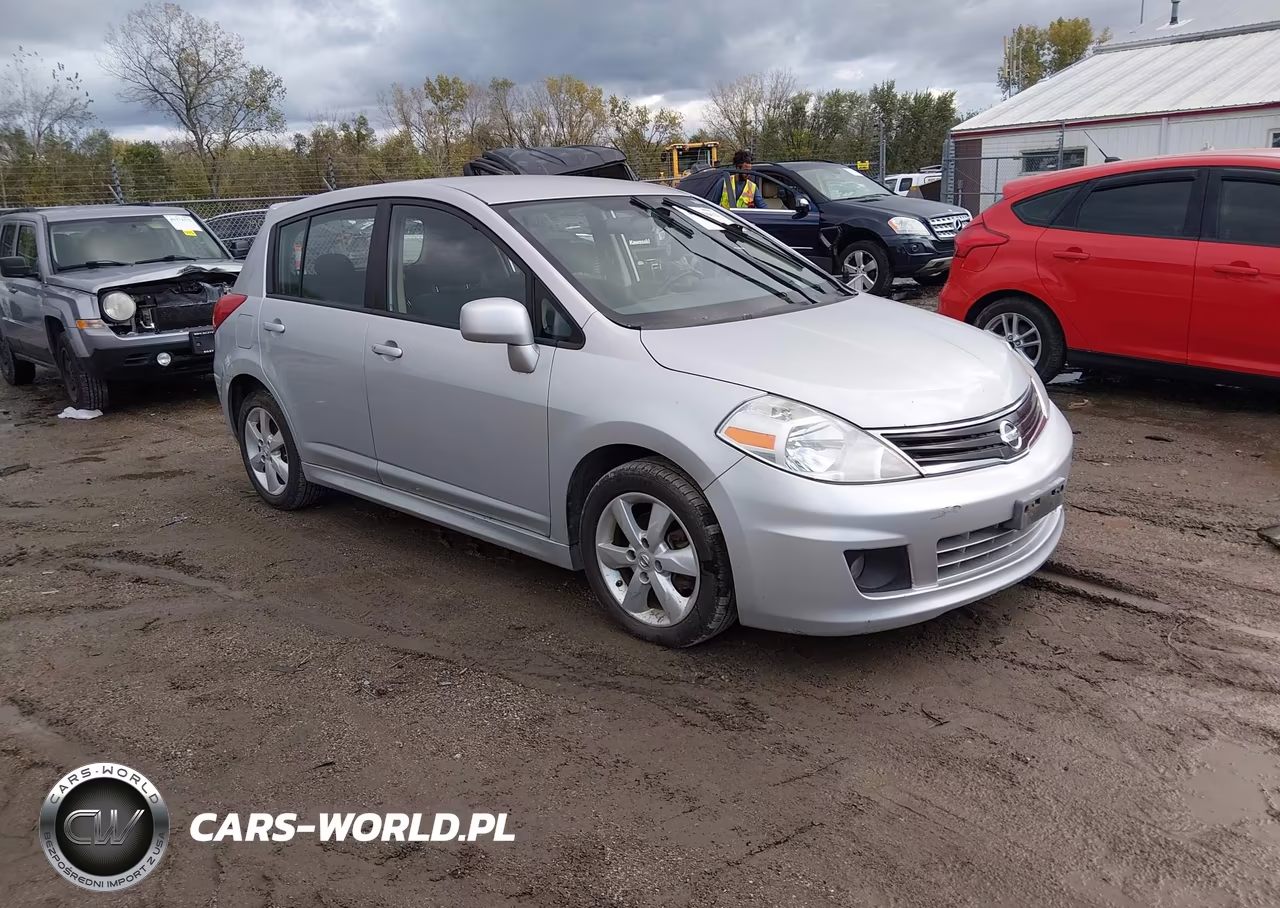 2010 Nissan Versa 1.8Sl VIN:3N1BC1CP5AL439250 - 1